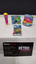 Zuru 5 Surprise Mini Brands- Toy Lot of 4 Items- Baby Shark- Balloons- Dora Microphone