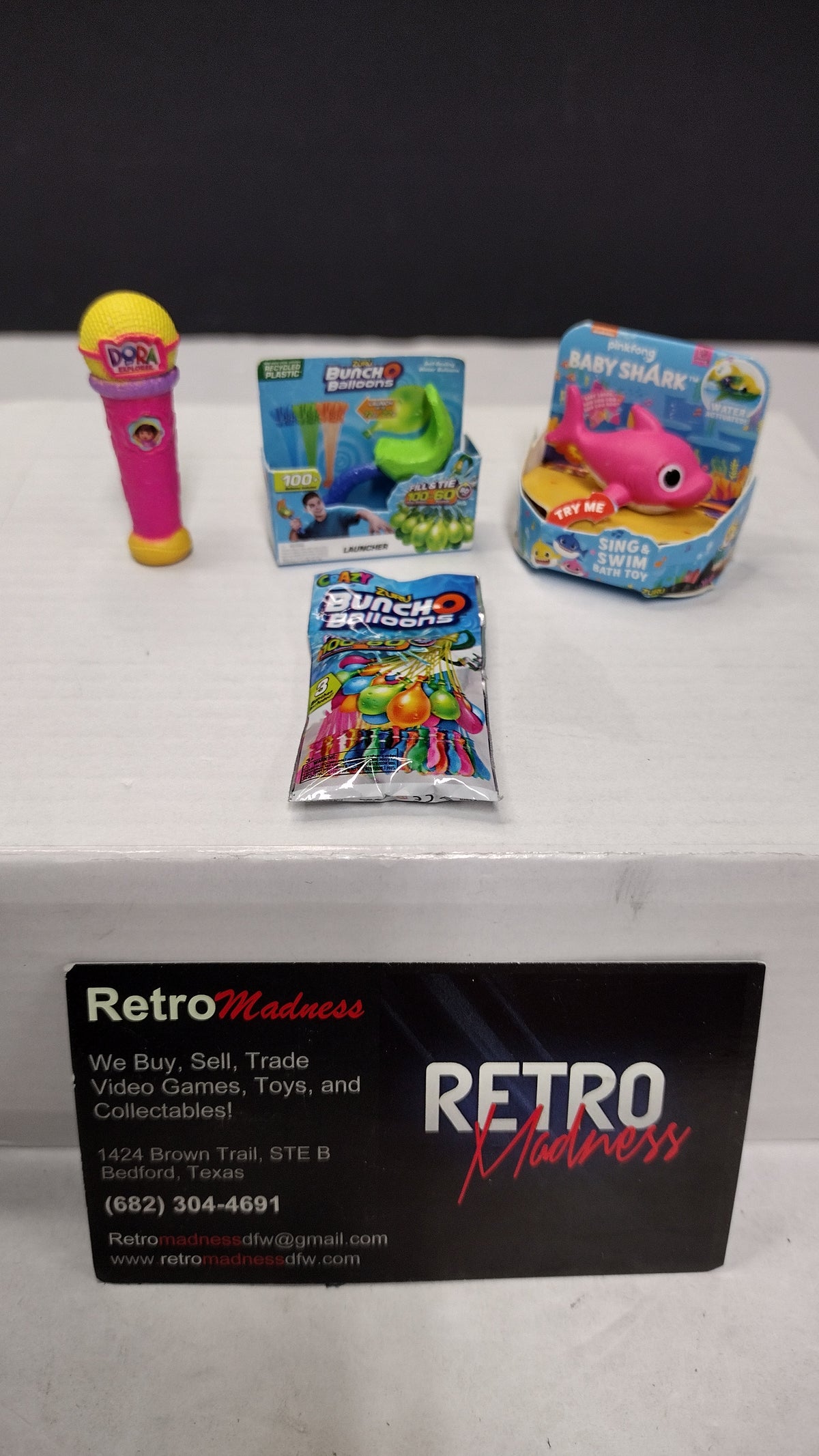 Zuru 5 Surprise Mini Brands- Toy Lot of 4 Items- Baby Shark- Balloons- Dora Microphone