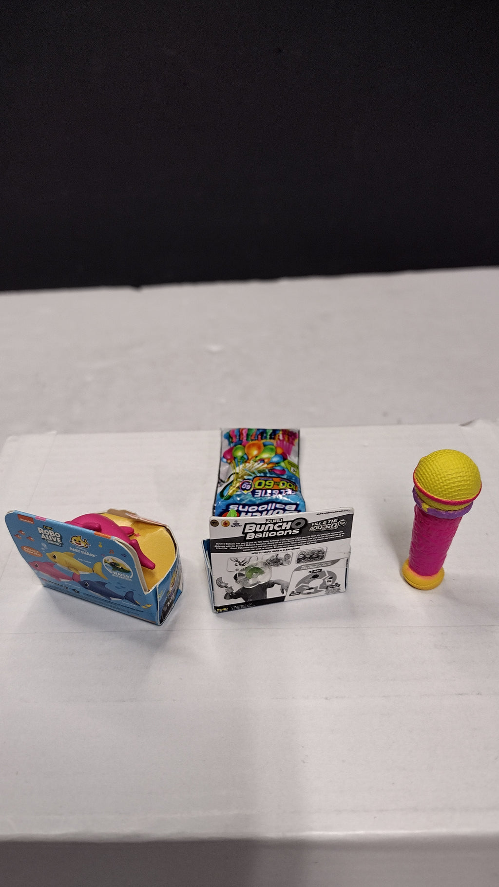Zuru 5 Surprise Mini Brands- Toy Lot of 4 Items- Baby Shark- Balloons- Dora Microphone