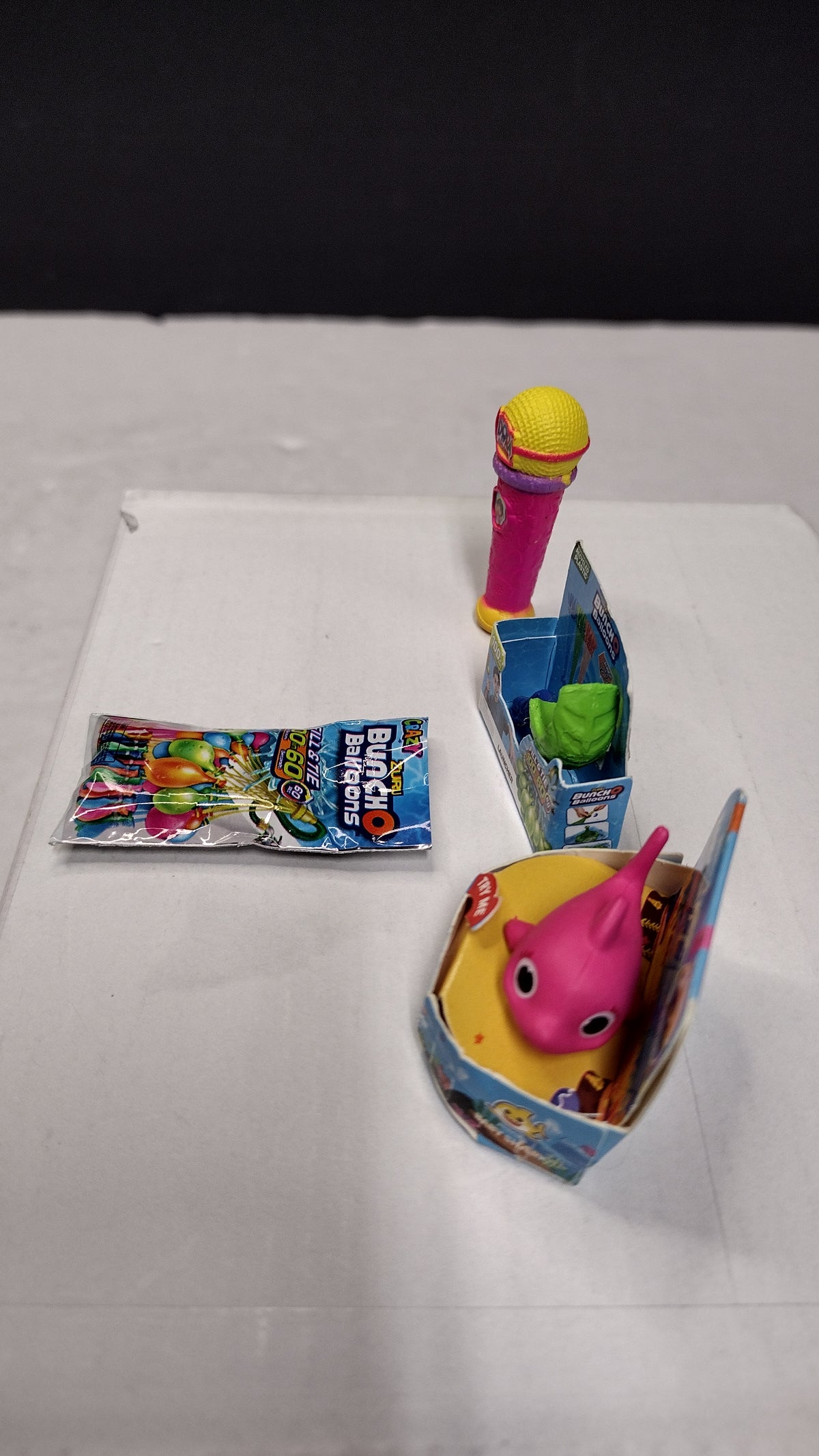 Zuru 5 Surprise Mini Brands- Toy Lot of 4 Items- Baby Shark- Balloons- Dora Microphone