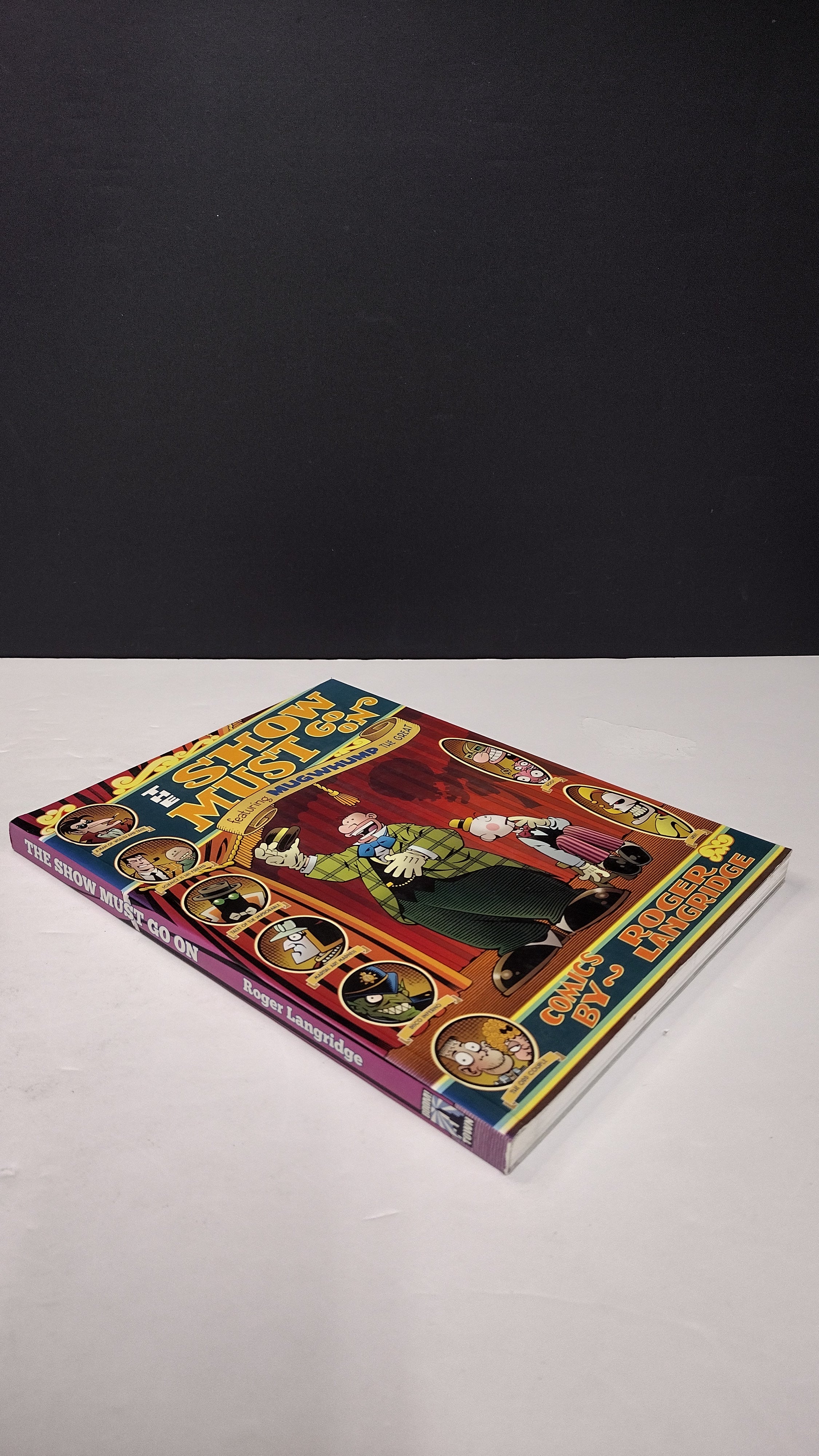 (MATURE) The Show Must Go On Mugwhump by Roger Langridge  – New Paperback