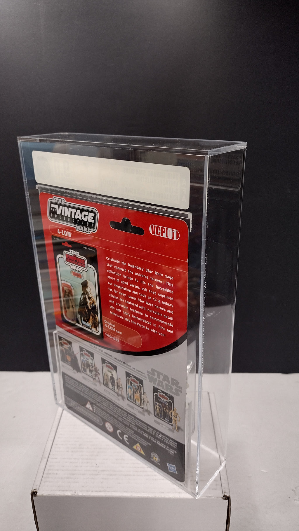 Star Wars The Vintage Collection Celebration V Exclusive 4-LOM 3.75" Action Figure – AFA 9.0 Uncirculated (Mint In Packaged)