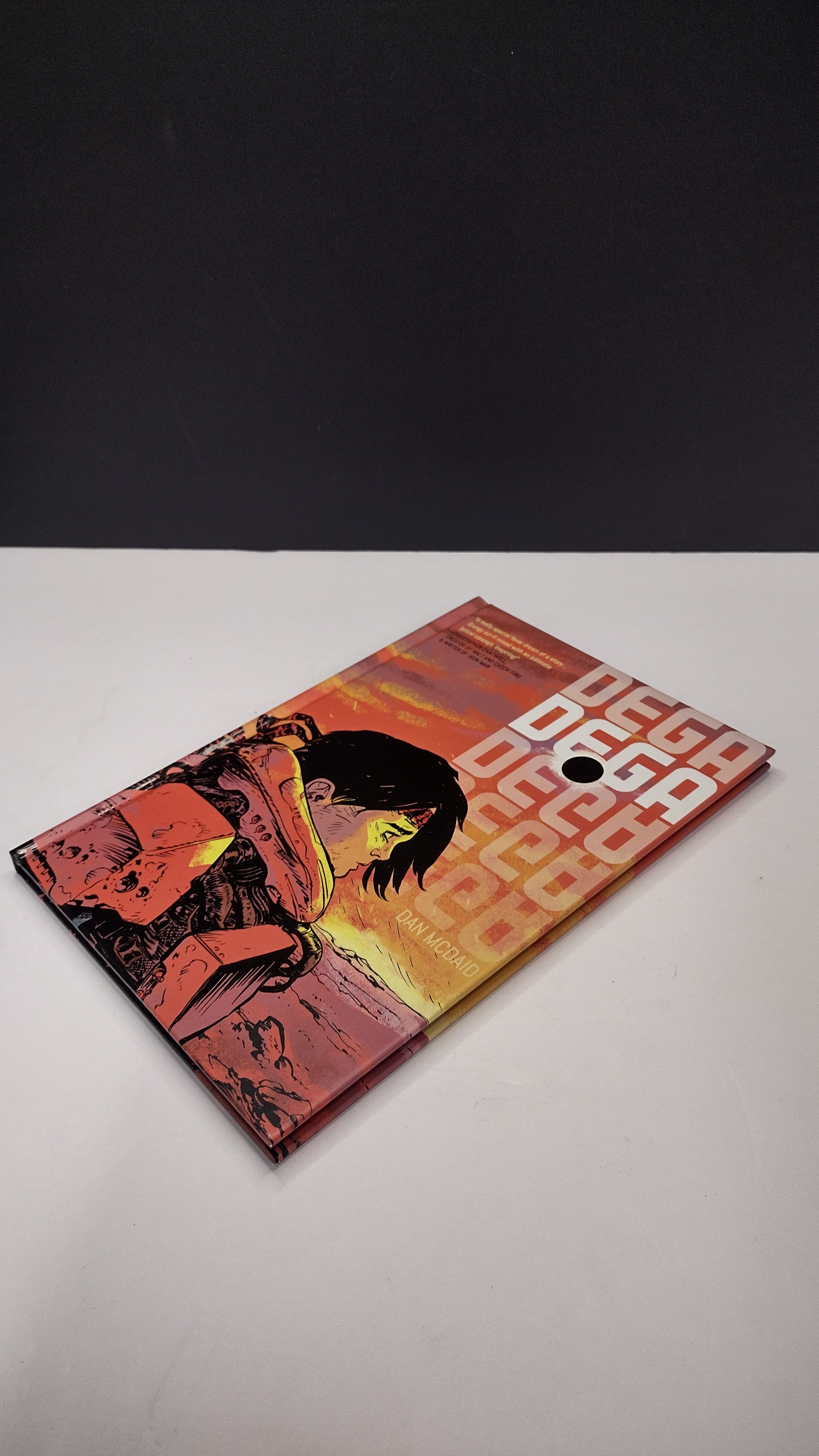 (MATURE) Dega Vol. 1 by Dan McDaid – Hardcover Graphic Novel