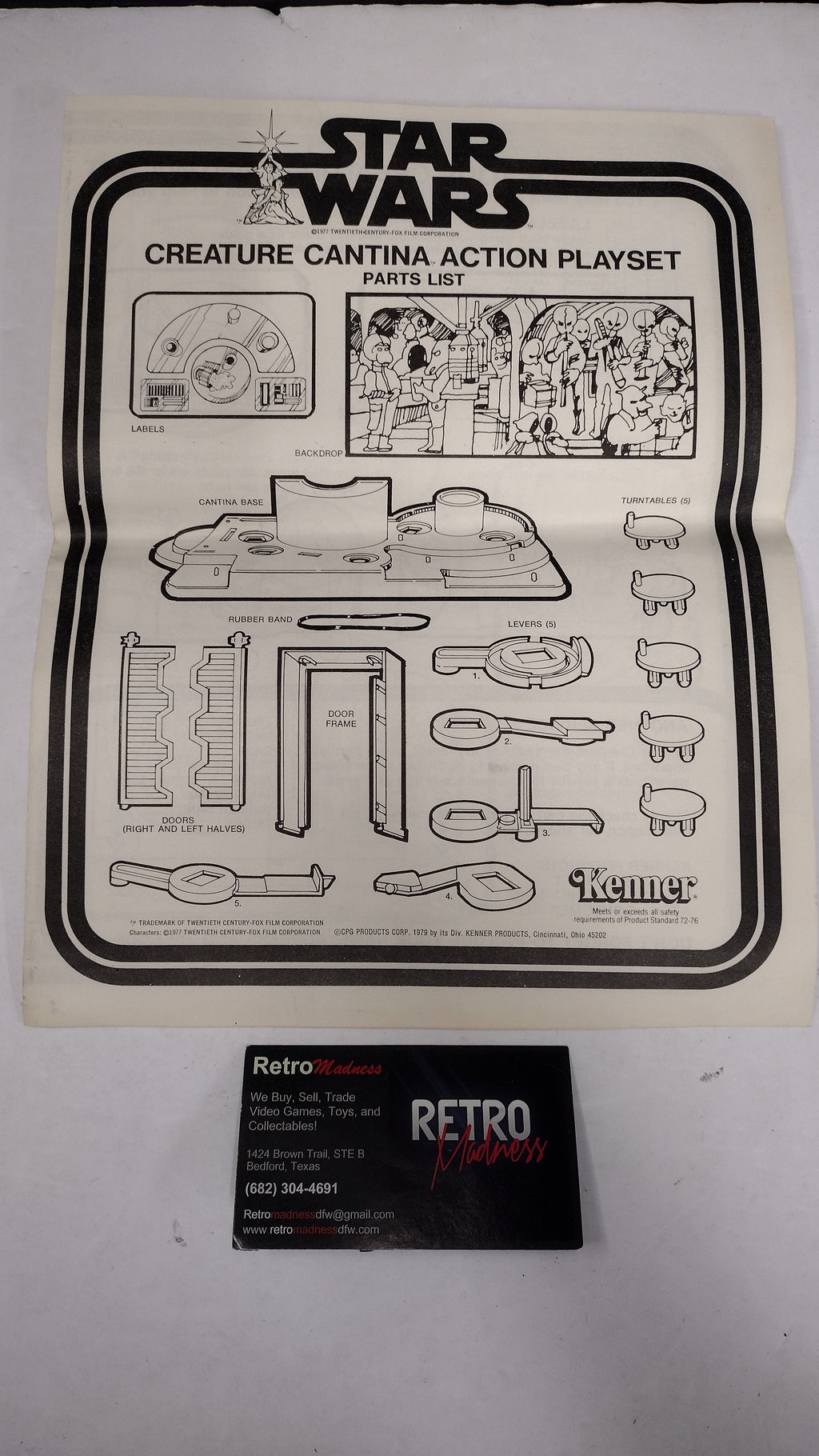 An open vintage Star Wars retro instruction booklet showing black-and-white assembly/playset drawings, placed next to a black 'Retro Blast!' box on a white surface.