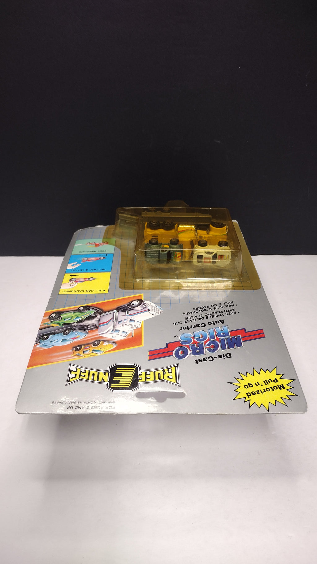 Vintage Ruff-E-Nuff Die-Cast Micro Rigs Auto Carrier (P.J. Toys - Sealed on Card / Yellowed & Damaged Blister Bubble)