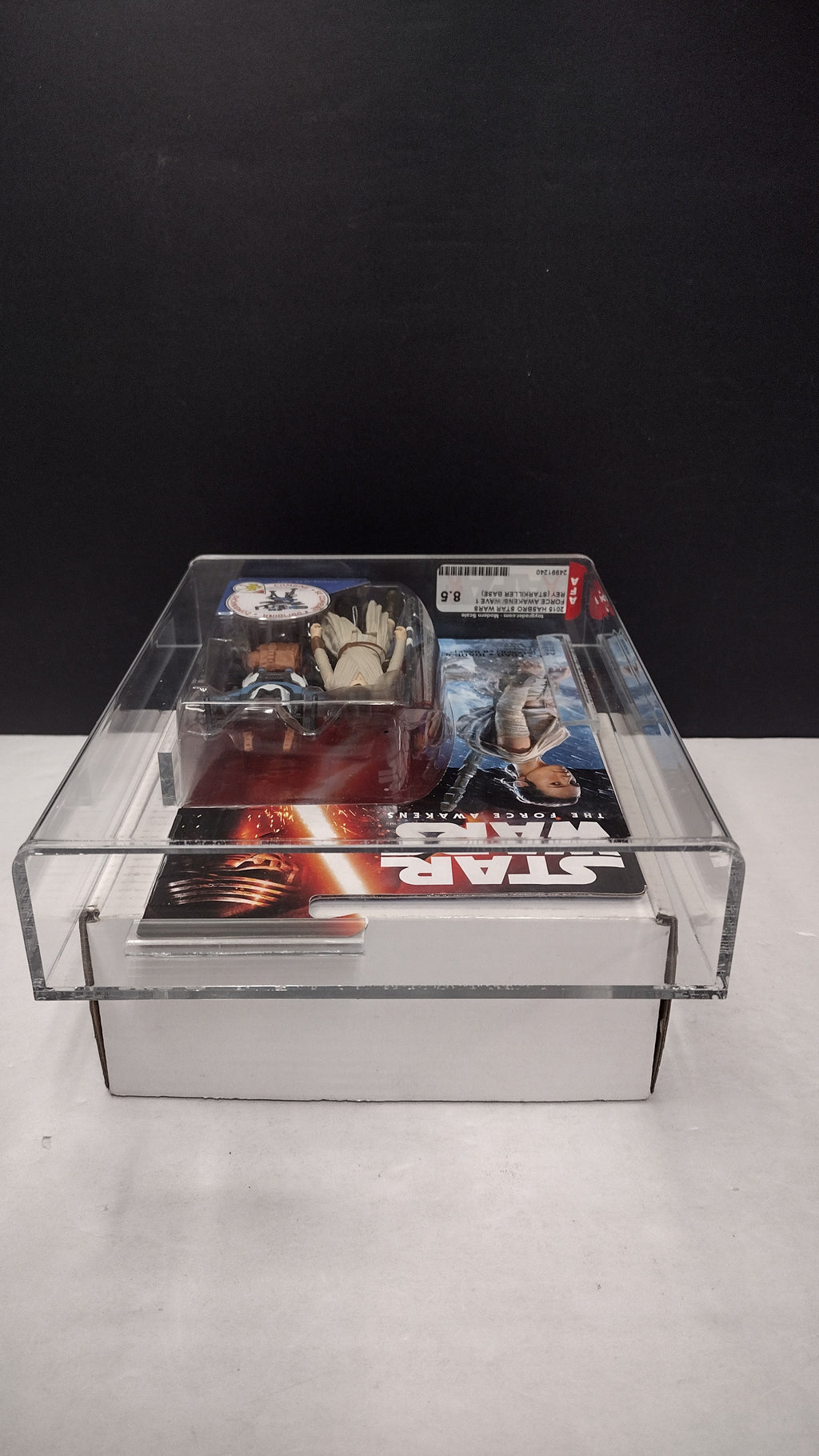 Star Wars: The Force Awakens Rey (Starkiller Base) 3.75" Action Figure – AFA Graded 8.5 NM+ (MIB)