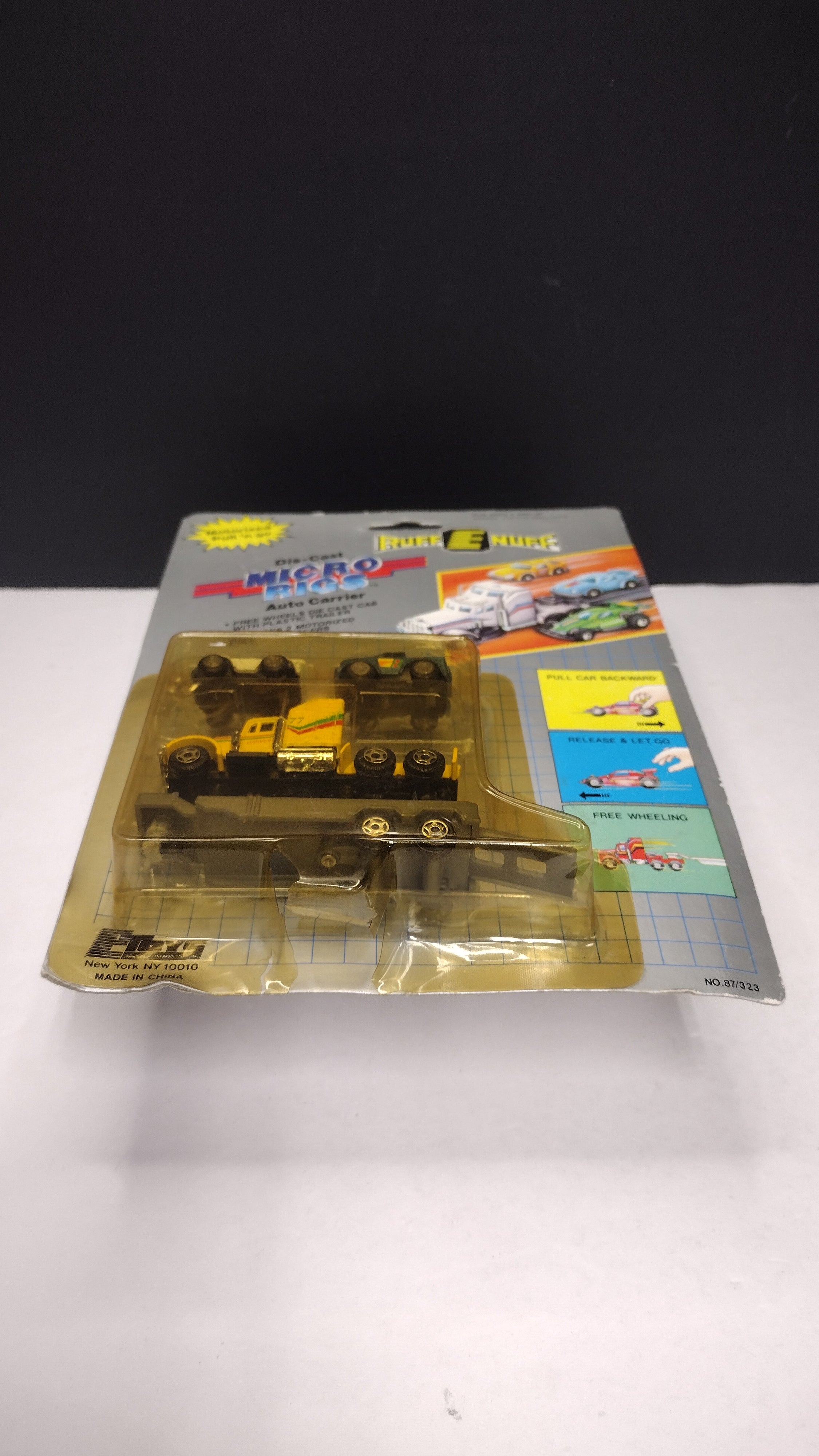 Vintage Ruff-E-Nuff Die-Cast Micro Rigs Auto Carrier (P.J. Toys - Sealed on Card / Yellowed & Damaged Blister Bubble)
