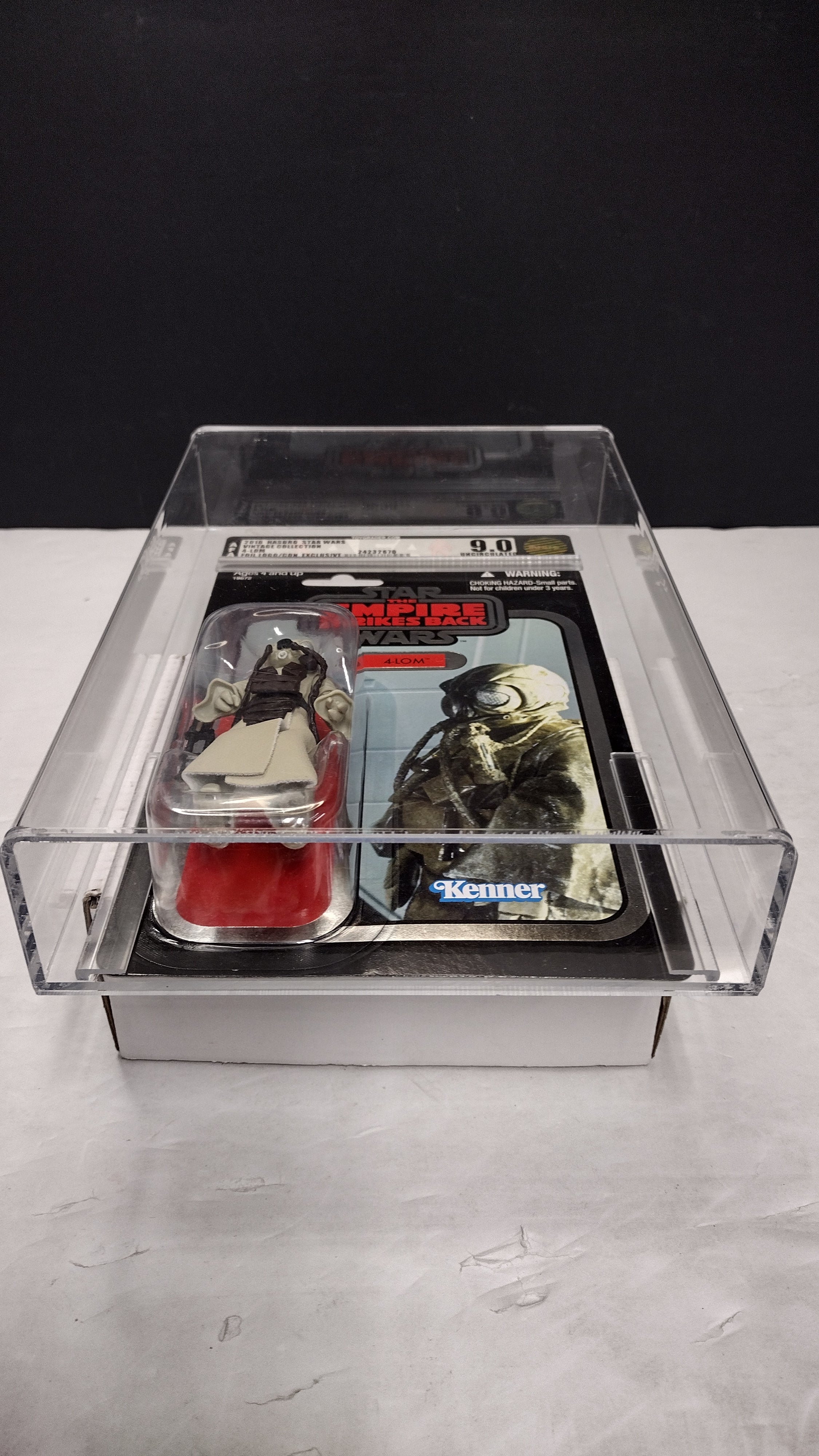 Star Wars The Vintage Collection Celebration V Exclusive 4-LOM 3.75" Action Figure – AFA 9.0 Uncirculated (Mint In Packaged)
